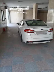  2 فورد فيوجن SE فل كامل فحص كامل مقاعد كهرباء مقاعد جلد فتحه فسقف والعديد من المواصفات سياره ممشى قليل