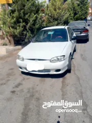  1 هيونداي اكسنت لون ابيض للبيع خالي قص قلبان والسعر قابل للتفاوش بشيء بسيط