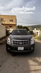  2 كاديلاك srx 2010 للبيع او بدل على سيارة صغيرة