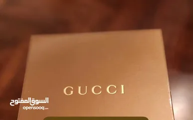  4 GUCCI ساعة