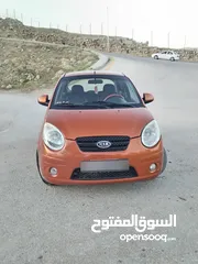  4 كيا بيكانتو موديل 2010 لون برتقالي محرك 1100قوي و اقتصادي  فحصها 3جيد قصعة مرخصة سنة تقريبا مطلوب في