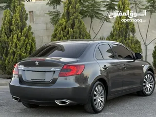  7 سوزوكي كيزاشي موديل 2013 بحالة الوكالةً فحص كامل