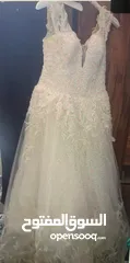  1 فستان زفاف مستعمل فقط لبس 4 ساعات