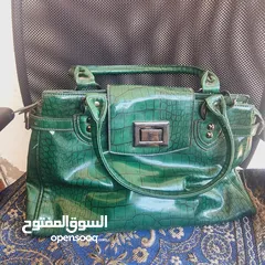  1 شنطة كتف اخضر زيتي