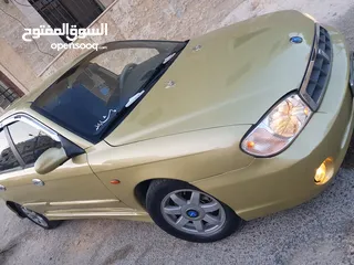  27 كيا سبكتر توماتيك اقساط دفعة 1200 دهان جديد  ماتور جديد  قير جيد  فحص مرفق  مكانيك سيارة مشية ناعمة