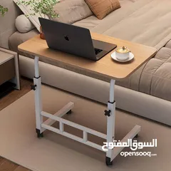  4 الطاولة الجانبية المتحركة – عملية وأنيقة   تصميم عصري يناسب أي زاوية بالبيت ويضيف لمسة مرتبة.