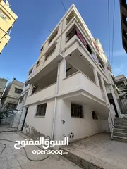  4 شقتين للبيع (أرضي + تسوية)  الزرقاء حي رمزي في منطقة حيوية جداً