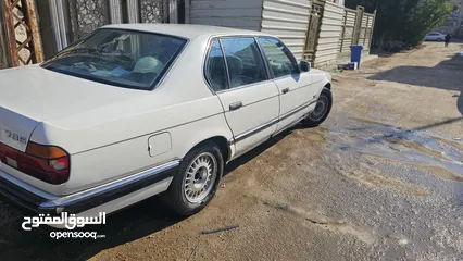  7 لون ابيض bmw 735 موديل 90