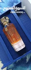  1 عطر خلطه القرشي جديد90مل للرجال والنساء  مع ستاند خشب لون ازرق