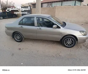  3 لانسر موديل 2005 قير عادي متور 1300