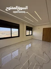  13 شقه طابق ارضي 144متر مع ترس 30 متر للبيع في جبيهه حي المنصور بموقع مميز
