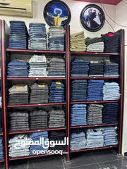  2 محل البسه واحذيه رجالي مجهز بالكامل للبيع بسعر مغري