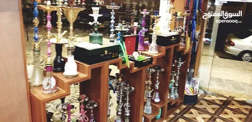  4 محل بيع نثريات و مستلزمات المدخن