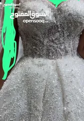  1 فستان زفاف