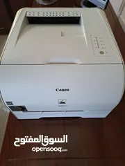  1 طابعة كانون ليزريه ملونه استعمال بسيط مع الحبر الاصلي