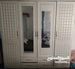  1 white 4-doors wardrobe  75omr Alhail