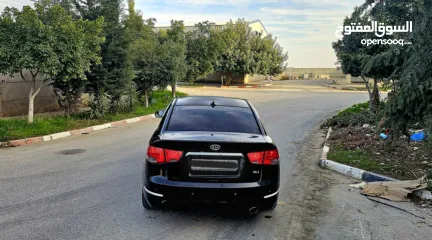  3 كيا فورتي فل مع فتحه سقف وبصمه 2011 اصل برايفت