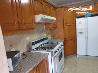  7 رقم الاعلان (5315) شقة أرضية للبيع في الرابية مقابل شيف اياد موقع مميز