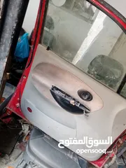  12 اربع ابواب وغطا امامي وغطا خلفي لشيري QQ 2006