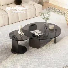  1 طاولة قهوة عصرية بسطح زجاجي أنيييق وتصميم حديث   هالطاولة بتجمع بين التصميم العصري والبساطة الراقية
