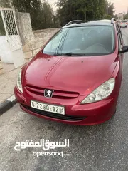  4 بيجو 307 2005  مطور2000 100% مكنيكيات الف الف دهان جديد مزجان حامي بارد منفوضة من النمرة ل النمرة