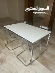  2 Table with chairs..