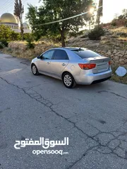  4 دفعه كيا فورتي 2009 ماتور1600 بنزين جير اوتماتيك حساسات خلفي مكيف شغال شبابيك كهر