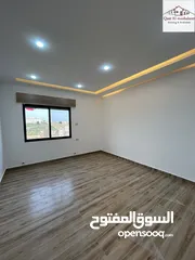  21 اقساط شقة شبه ارضية فاخرة في شفا بدران الجبيهة