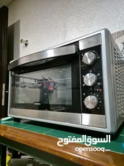  4 فرن كهربائي kenwood electric oven  70L