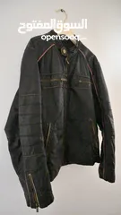  1 VINTAGE AMERICAN LEATHER JACKET WITH DETAILING