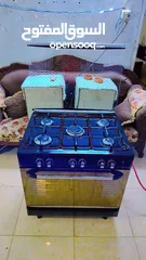  4 غازي يونيفرسال ايطالي لون اسود 80سم مجدد بالكامل كهرباء الفرن شغاله نار زرقاء للطهي يوجد كفاله تهري