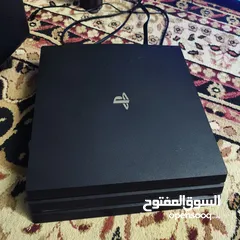  2 (Playstation 4 pro (1T بلايستيشن 4 برو 1 تيرا  امريكيه مع الكرتونه و ايد اصليه و وحده كوبي PS4 (1T)