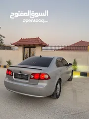  6 كيا لوتزي 2006 3 جيد لون سلفر ماتور 2000cc
