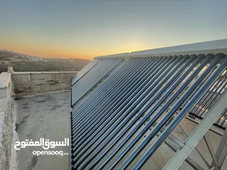  3 200 انبوب زجاجي حراري لتسخين المياه مع قواعد هيكل المنيوم وكل ما يلزم لتثبيته بحالة ممتازة جدا