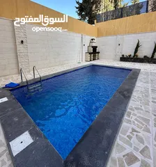  1 شقة مع مسبح خاص و حديقة في حي الجامعه الاردنية بتشطيب مميز