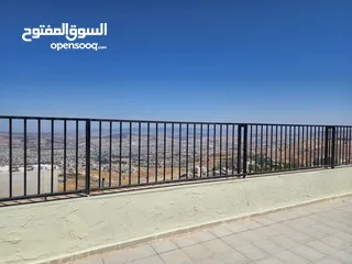  17 شقة مع رووف و ترس إطلالة أبدية خلابة  على جبال جرش و السلط في أجمل مناطق الجبيهة ابو عوف تنظيم أ