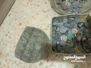  1 مجموعه عملات وقطع حجريه