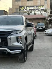  18 ميتسوبيشي L200 223 زيرو مرتجع ماشي 15 فقط بلاك ايدشن فحص كامل وله ملاحضه