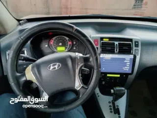  10 جيب هونداي توسان موديل 2007 ماطور 2000 لون خمري كام لا ينقصه شيئ