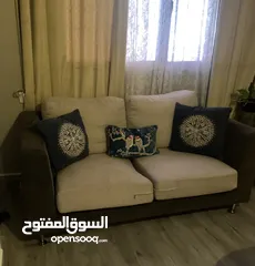  1 Beige color sofa