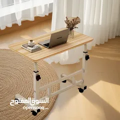  9 الطاولة الجانبية المتحركة – عملية وأنيقة   تصميم عصري يناسب أي زاوية بالبيت ويضيف لمسة مرتبة.