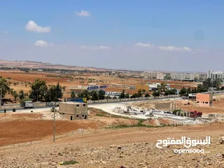  6 للبيع ارض بجانب جامعة اربد الاهلية مع اجمل اطلالة ومقابل جامعة جدارا مفروزة قوشان مستقل شارعيين