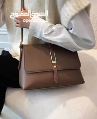  8 شنتة ستاتي اصلي مع العلبة  جلد طبيعي جودة عالية جدا  سحاب ويد طويلة  مقاس 21×27