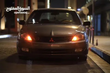  5 ميتسوبيشي لانسر 2009 glx