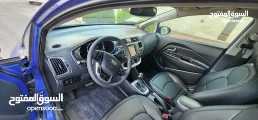  15 KIA RIO 2012 كيا ريو 2012 هاتش باك فل كامل مع فتحه أعلى مواصفات