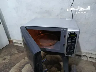  2 ميكرويف سونا لون سلفر واسود 25لتر حجم صغير  شغال ميه بالميه فحص يوجد توصيل قابل للتفاوض