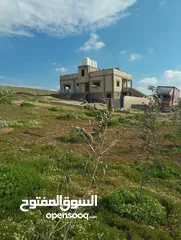  14 ارض مع بيت طابقين للبيع