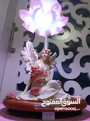  1 اضاءة غرفة  جانبيه على شكل ملاك الاضاءه بالالوان متعدده
