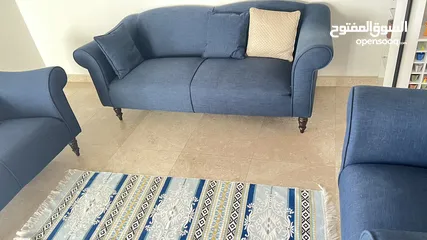  1 Navy blue sofa's with 1 side chair  Used but in an excellent condition