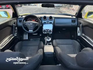  21 هونداي توسكاني شكل 2005 كامله الاضافات